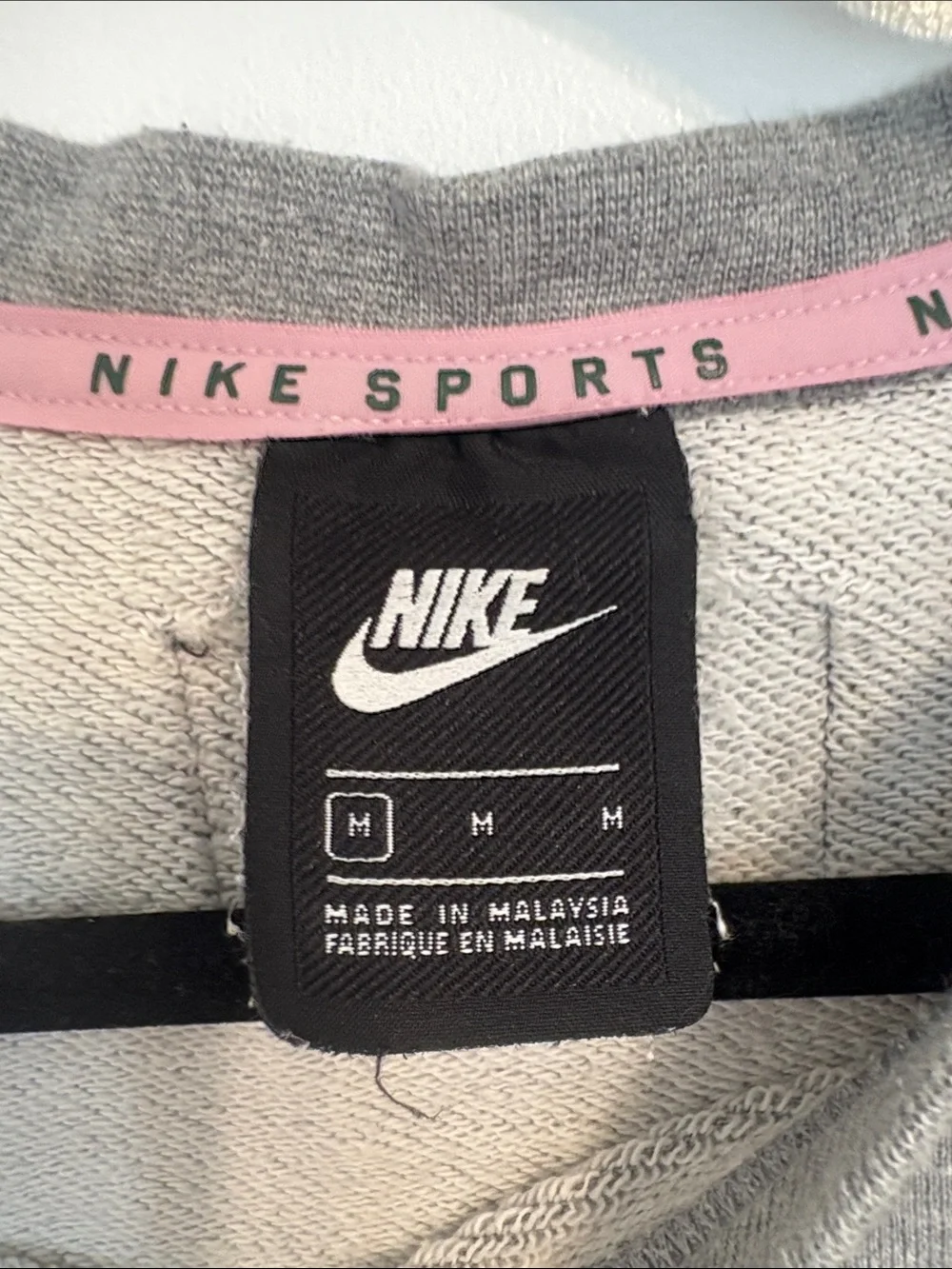Nike Gray Crewneck Sweatshirt with White Swoosh and Yellow 'Sportswear' Text